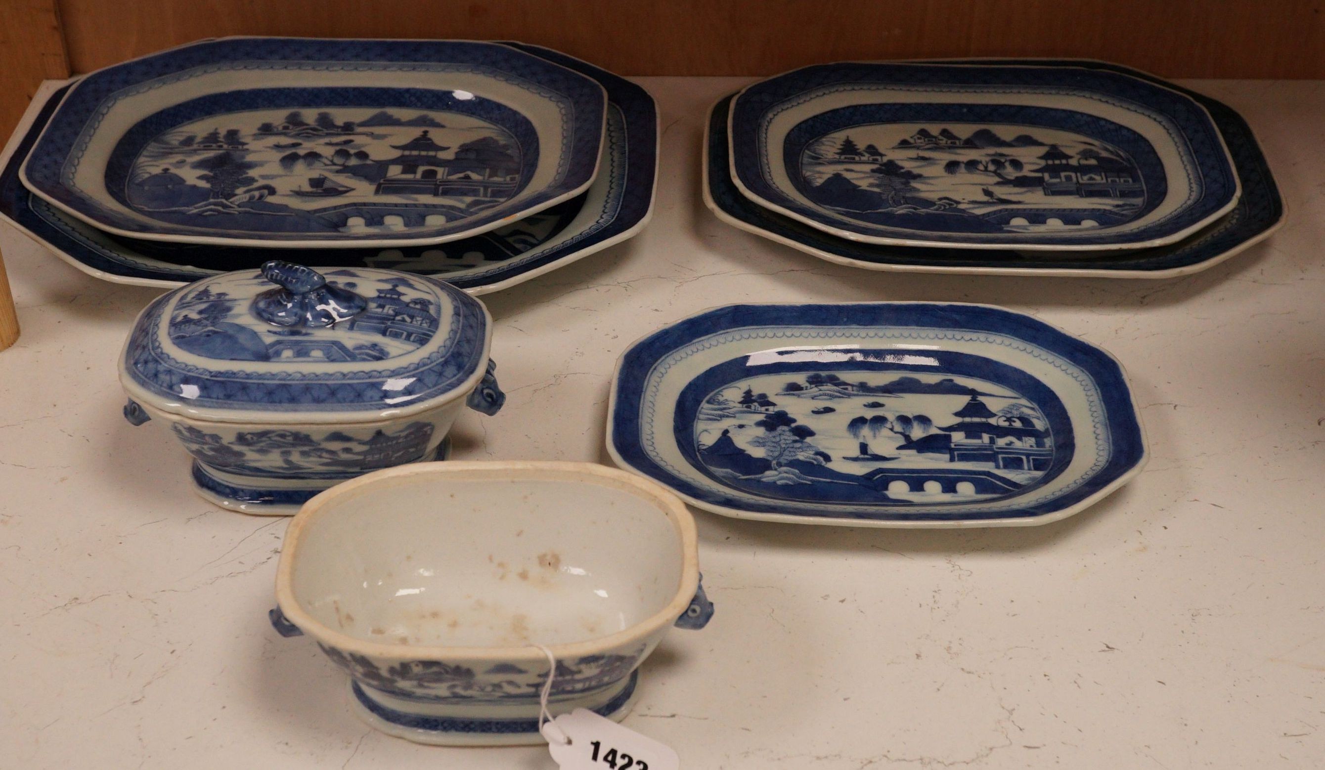 A group of Chinese blue and white porcelain, early 19th century, to include five graduated trays, and two tureens